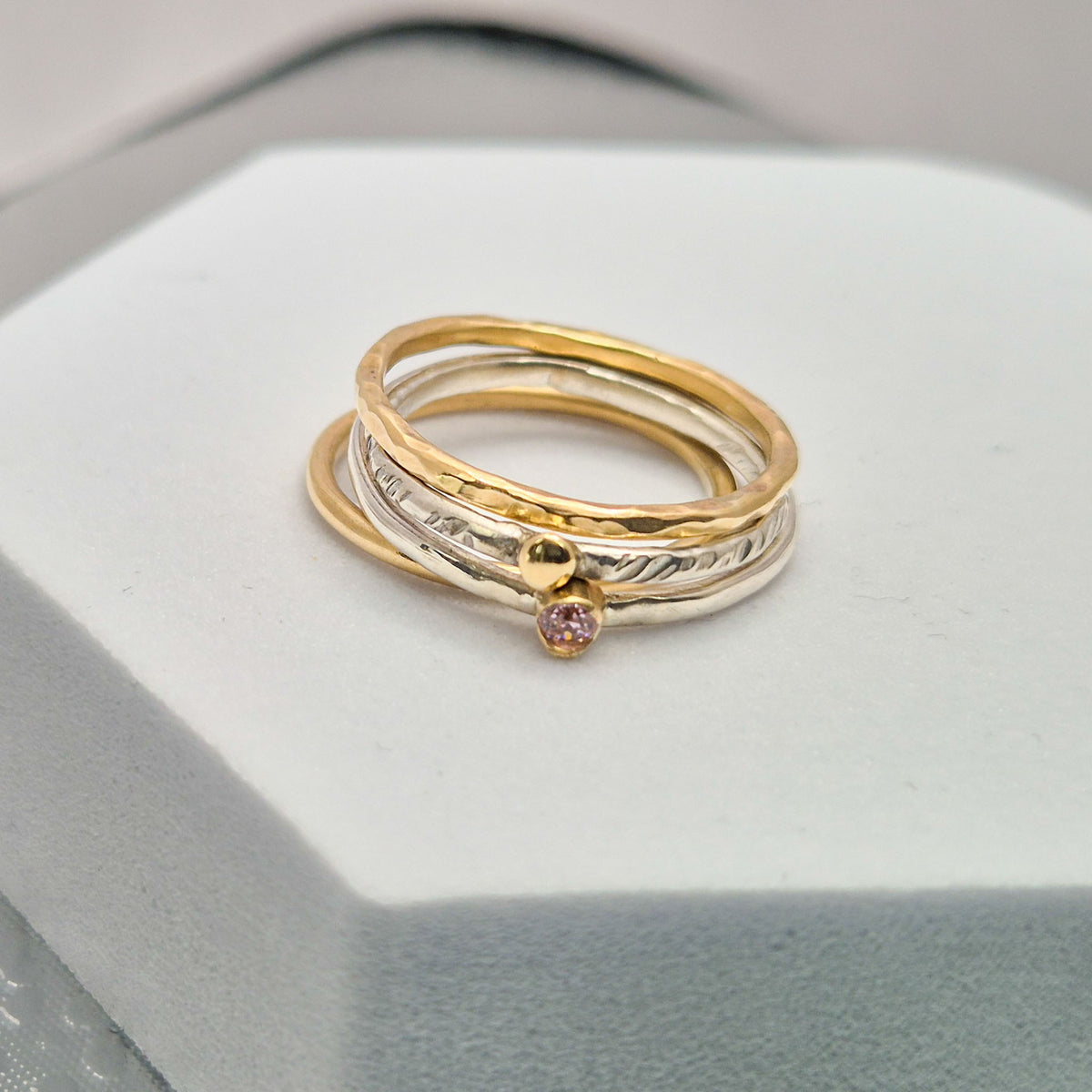 Stacking rings with gold nugget and stone set