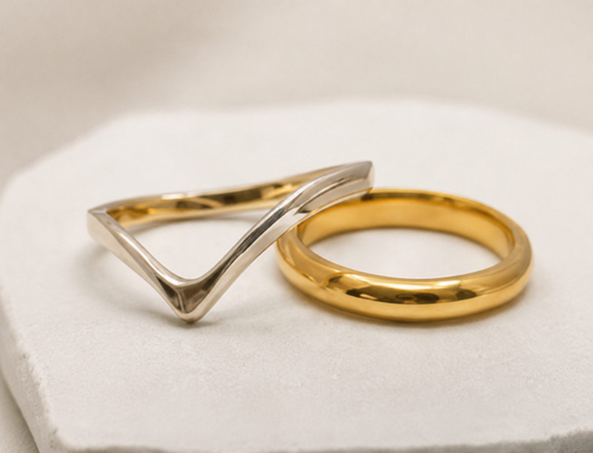 silver wishbone ring and gold wedding band