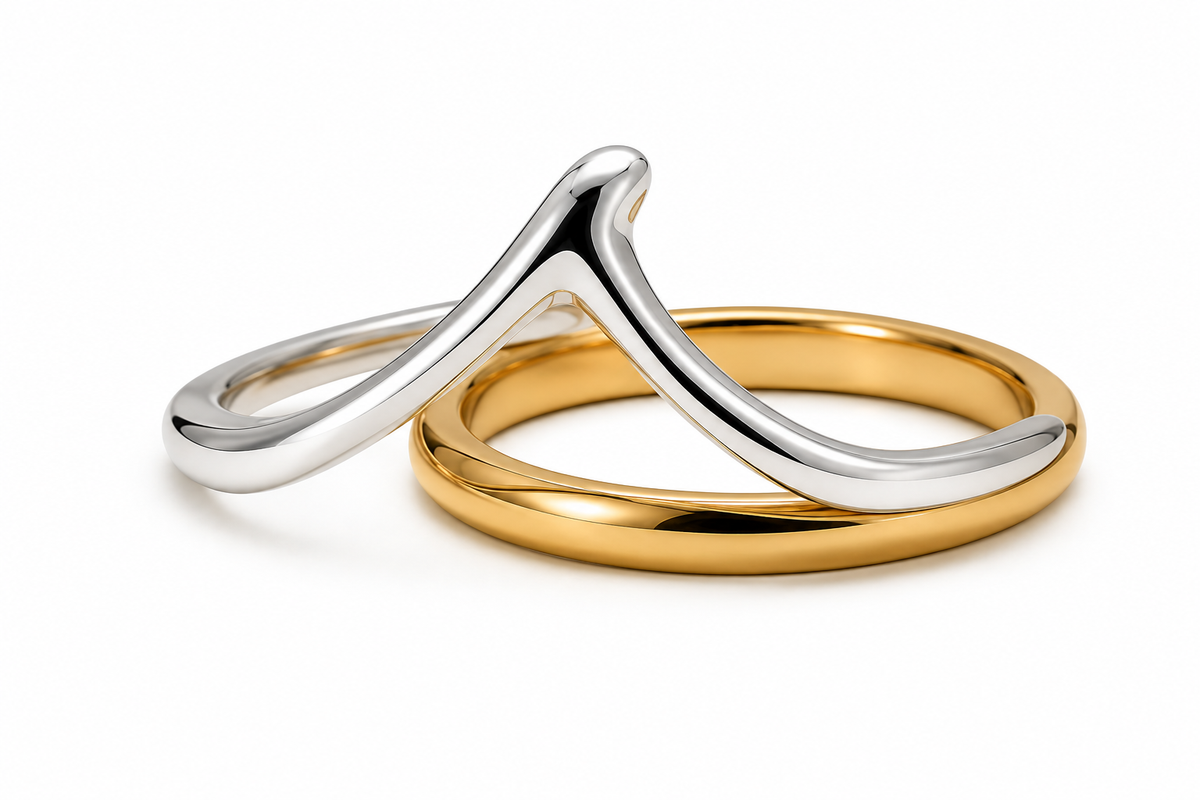 silver wishbone ring and gold wedding band
