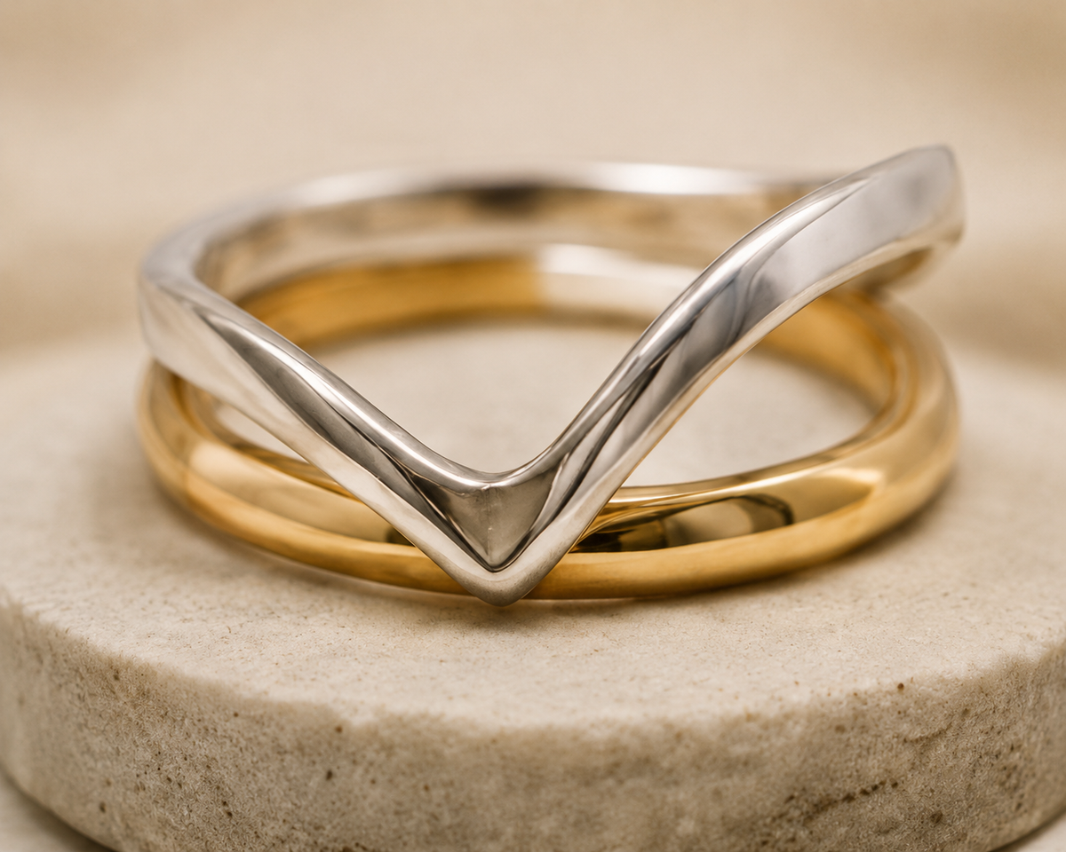 silver wishbone ring and gold wedding band